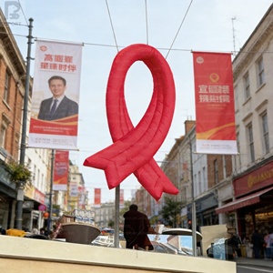 ริบบิ้นสีแดงเป่าลมขนาดใหญ่ รุ่นโบว์สีแดงเป่าลม พร้อมไฟ LED ส่องสว่างเพื่อสร้างความตระหนัก สำหรับแคมเปญสุขภาพ/กิจกรรมสาธารณะ/โปรโมชั่น - Product Image 3