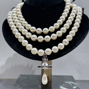 Collar Saturno Estilo Punk Empress Dowager, Cadena de Aleación de Lujo para Banquete, Diseño de Gota de Agua Tridimensional de Tres Capas - Product Image 1