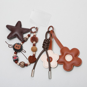 Correa para teléfono con cuentas estilo vintage americano, colgante de cuero con flor y estrella para bolso, llavero de donut, bonito colgante de cámara CCD para mujer - Product Image 5