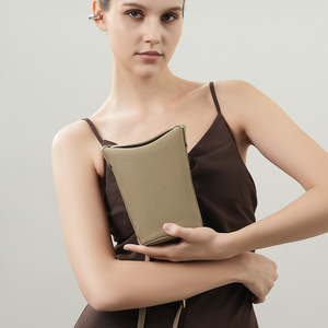 Sac bandoulière haut de gamme en cuir de vachette véritable pour femme, mini sac seau avec fermeture éclair, polyvalent et tendance pour l'automne Tanjing - Product Image 2