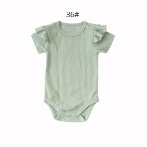 Grosir piyama bayi perempuan baru lahir, baju monyet Onesie katun organik berjumbai polos - Product Image 6