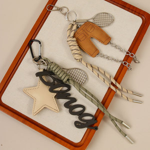 Mengda Miu Style Mode Mini PU <span class=keywords><strong>Pantalon</strong></span> Anglais Lettre <span class=keywords><strong>Raquette</strong></span> Sac Pendentif Accessoire Ins Étoile À Cinq Branches Tressé Porte-clés - Product Image 4