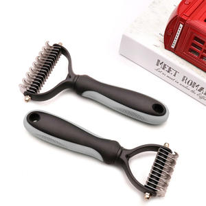 Pet Knot Comb Grooming Tpr Pet Brusher para perros y gatos - Product Image 3