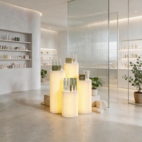 Présentoir cylindrique en papier kraft alvéolé LED, vente en gros directe usine, pour hall d'hôtel et salle d'exposition