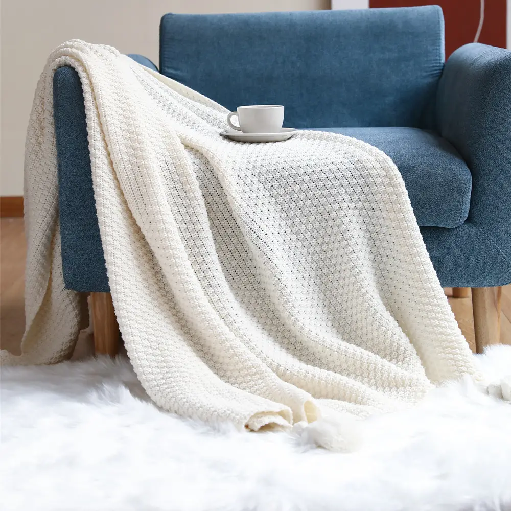 Vente en gros de couverture gaufrée super douce texturée de couleur unie pour canapé-lit couverture légère en tricot