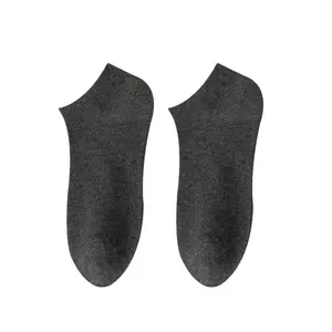 Chaussettes pour les voyages d'affaires Couleur unie Chaussettes jetables pour bateau à jambe courte Chaussettes jetables pour hommes en coton