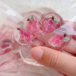 NEW Viral Grape Cat Paw <b>Squishy</b> Toy - Bestseller Cute Fidget Stress Relief Gift for Teens&Adults Therapy Party Favors - Product Image 1