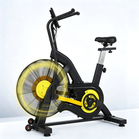 Vélo d'exercice à résistance par ventilateur avec bras synchronisés et moniteur numérique pour entraînement cardio à domicile