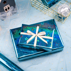 Papier cadeau bleu laser, papier cadeau étoile de Noël pour enfants, disponible en stock et personnalisable, impression couleur - Product Image 2