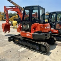 Chargeuse compacte sur chenilles Kubota U55-4 d'occasion avec chenilles en acier et système hydraulique auxiliaire à vendre pour travaux d'ingénierie