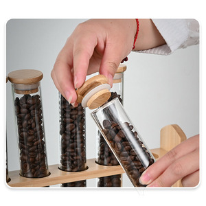 Tubo <span class=keywords><strong>di</strong></span> <span class=keywords><strong>vetro</strong></span> chicchi <span class=keywords><strong>di</strong></span> caffè barattolo <span class=keywords><strong>di</strong></span> stoccaggio <span class=keywords><strong>con</strong></span> <span class=keywords><strong>coperchio</strong></span> <span class=keywords><strong>di</strong></span> bambù ermetico e supporto <span class=keywords><strong>di</strong></span> bambù rotondo tubo <span class=keywords><strong>di</strong></span> <span class=keywords><strong>vetro</strong></span> inferiore <span class=keywords><strong>con</strong></span> <span class=keywords><strong>coperchio</strong></span> <span class=keywords><strong>di</strong></span> bambù - Product Image 2