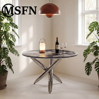 Table à manger moderne Moon, base en acier inoxydable poli en forme de X, plateau en verre artistique, élégante, pour hôtel, villa, restaurant