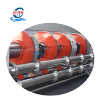 Machine à rainurer rotative automatique pour boîtes en carton ondulé avec emballage en carton