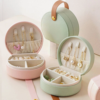 Boîte à bijoux de voyage portable en cuir PU avec poignée, mini étui de rangement pour bagues, boucles d'oreilles, colliers, organisateur, cadeau pour femme, capacité 0-1L