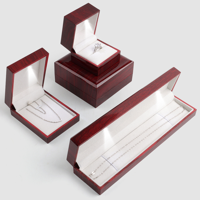 Olai Wholesale Luxury Wooden Grain Appearance Jewelry Set Packing Box Plastic Led Light Jewels Storage Case