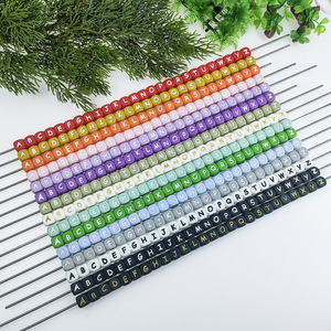 Perles en silicone de qualité supérieure, irrégulières, luminescentes, de qualité alimentaire, noires et blanches, avec lettres anglaises pour la dentition - Product Image 6