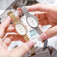 Montre ovale à quartz pour femme, prix direct usine, cadran brillant, index en cristal, bracelet extensible en acier inoxydable