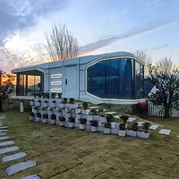 Maison mobile modulaire préfabriquée intelligente de luxe avec 2 ou 3 chambres, salon et cuisine, style capsule spatiale moderne