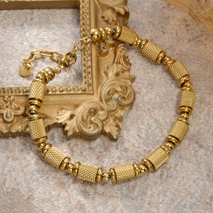 Bracelet à maillons en acier inoxydable premium plaqué or 18 carats, unisexe, de qualité supérieure, avec perles cylindriques texturées brillantes, durable, vente en gros en vrac - Product Image 1