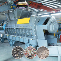 Déchiqueteur spiral pour déchets textiles, tapis, sacs en plastique, films plastiques, matériaux textiles souples