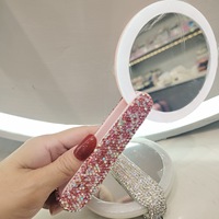 Vente en gros Nouveau miroir de maquillage rond de poche portable Miroir à main avec lumières LED