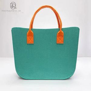 กระเป๋าถือผ้าสักหลาดความจุขนาดใหญ่แบบเรียบง่ายสำหรับผู้หญิงกระเป๋าช้อปปิ้งแบบพกพาและถุงของขวัญมีซิปปิดโพลีเอสเตอร์พิมพ์โลโก้ได้ - Product Image 3