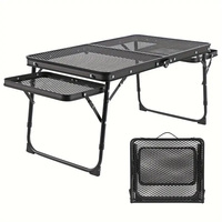 Mesa plegable para asar al aire libre con malla metálica, ligera, expandible, estilo maleta.