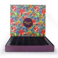 Boîte de chocolats de luxe Ferrero Rocher avec ruban, emballage en carton, design de luxe, modèles de séparateurs, matériaux recyclés