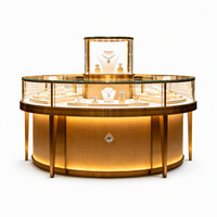 Vitrine de présentation de bijoux ronde en verre doré sur mesure OEM ODM, vitrine éclairée pour grand magasin