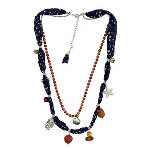 Collar Bohemio para Mujer con Dijes de Imitación de Perlas, Dijes de Metal Dorado, Tela Azul Marino con Puntos, Ecológico y Hecho a Mano - Product Image 1