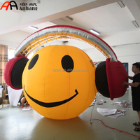 AnHang Casque audio gonflable géant personnalisé en forme de visage souriant, accessoire publicitaire pour événements musicaux, clubs et centres commerciaux