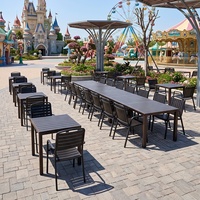 Table et chaises d'extérieur noires personnalisées, imperméables et résistantes à la rouille, pour les zones panoramiques, les cafés en plein air et les cours intérieures