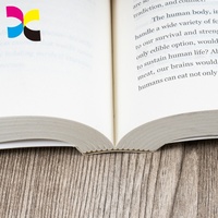 Impression de livres brochés personnalisés et durables pour romans, éducation et usage professionnel