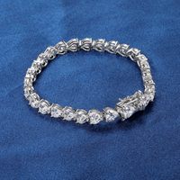 Pulsera de tenis de latón con circonita cúbica en forma de corazón, engaste de púas, cierre de seguridad, joyería para mujer al por mayor