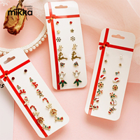 Boucles d'oreilles clous Père Noël et clochettes de sapin, lot de 8 paires sur carte, pour femme