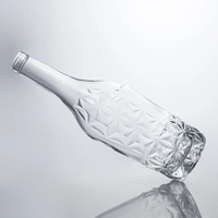 Bouteille en verre transparente à motif étoile en relief OLATEC, bouteille en verre à col long vide pour l'emballage du whisky et du brandy