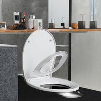 Abattant de toilettes moderne 2-en-1 en plastique avec fermeture douce et réglage de la pression de l'eau pour l'apprentissage des enfants et de la famille