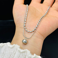 Collier en acier inoxydable à double couche, tendance pour femmes, pendentif en forme de petit haricot doré, collier tendance et polyvalent, cadeau