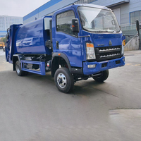 Camion compacteur de déchets ISUZU 4x2 de haute qualité |   Camion de compression des déchets durable pour l'exportation