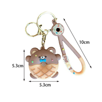 Porte-clés créatif en PVC souple avec pendentif animal en forme de beignet Accessoire mignon en caoutchouc pour voiture Vente en gros Imprimé UV