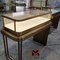 Vitrine de présentation sur mesure pour bijoux, en verre, avec comptoir en métal brossé, autoportante, éclairée par LED, pour montres, pour magasin de détail