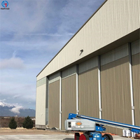 Longue portée assemblage rapide structure en acier préfabriqué poutre en h hangar avion avion hélicoptère usine galvanisé métal maisons hangar