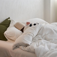 Parure de lit quatre pièces en coton 100% de qualité supérieure pour bébé, motif gaufré, réversible, 600 fils, couleur unie, drap et housse de couette, luxueuse et haut de gamme