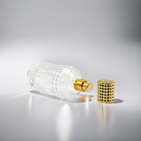 Fabricant à vendre Pompe de pulvérisation au design unique Bouteille en verre de parfum en forme de cylindre rond de 50ml