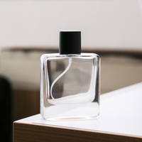 Bouteille de parfum en verre 50ml vide Portable atomiseur de parfum Transparent carré atomiseur de Cologne avec applicateur de pulvérisation pour le voyage