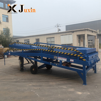 Rampe de chargement mobile hydraulique réglable, durable et transportable pour le chargement de conteneurs en usine et sur camions