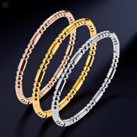 Bracelets en acier inoxydable plaqué or 18 carats, gravure CNC cylindrique, accessoires pour hommes, bijoux pour femmes, vente en gros