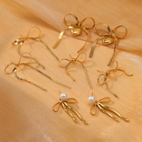 Boucles d'oreilles pendantes en acier inoxydable plaqué or 18 carats PVD Novirassine, avec nœud en ruban organique et perle, bijoux romantiques d'esthétique vintage pour femmes