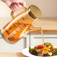 Carafe en verre ambré en gros avec couvercle et poignée dorés, marquage de mesure, pour eau, jus, café infusé à froid, en vrac