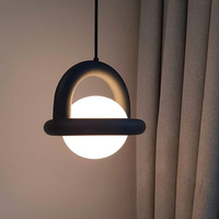 Suspension moderne en forme d'orbite avec cadre sculpté pour chambre à coucher, chevet, salle à manger, îlot de cuisine, café, hôtel, bar